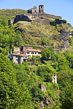 Medieval castle dating from the 15th century, and church of St. Madeleine, Saint Ilpize village, Haute Loire, France, Europe