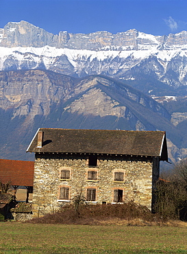 Exterior of a stone farm house and mountains near Chambery, with Mont Granier behind, Savoie (Savoy) in the Rhone-Alpes, French Alps, France, Europe