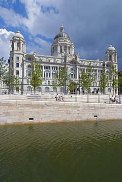 The Port of Liverpool Building, one of the Three Graces, as seen from the new Leeds Liverpool Canal link, Liverpool, Merseyside, England, United Kingdom, Europe