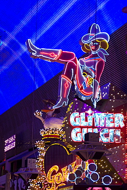 Illuminated girl on sign at Glitter Gulch, Fremont Street, Las Vegas, Nevada, United States of America, North America