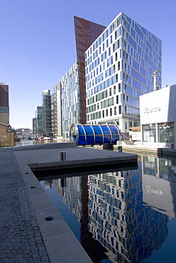 The new architectural development alongside Paddington Basin, part of the Regent's Canal, London, W2, England, United Kingdom, Europe