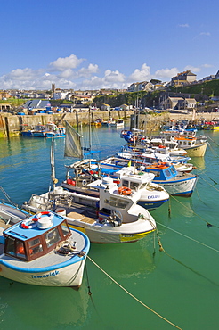 Small fishing boats in the harbour at high tide, Newquay, North Cornwall, England, United Kingdom, Europe