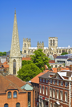 York Minster, northern Europe's largest Gothic cathedral, the spire of St Mary's church, and the skyline of the city of York, Yorkshire, England, United Kingdom, Europe