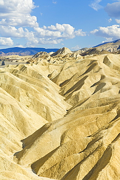 Siltstone eroded formations of Zabriske Point, Furnace Creek, Death Valley National Park, California, United States of America, North America