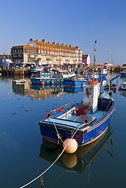 West Bay harbour with yachts and fishing boats, Bridport, gateway town for the Jurassic Coast, UNESCO World Heritage Site, Dorset, England, United Kingdom, Europe