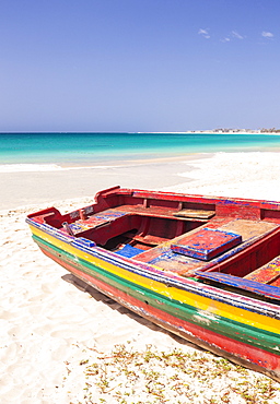 Colourful traditional local fishing boat on the beach at Santa Maria, Praia da Santa Maria, Sal Island, Cape Verde, Atlantic, Africa