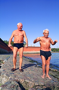 Elderly bathers on the banks of the Neva River, St Petersburg