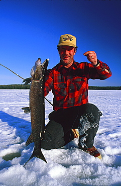 Man with caught pike, Ontario