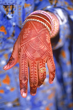 Henna decoration on womans hand wearing ring, Oman, Middle East