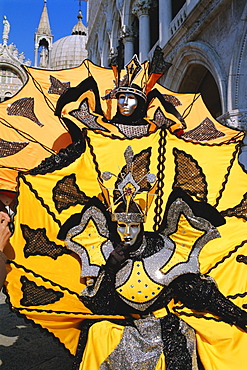 Person wearing masked carnival costume, Venice Carnival, Venice, Veneto, Italy