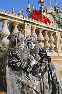 People wearing masked carnival costumes, Venice Carnival, Venice, Veneto, Italy