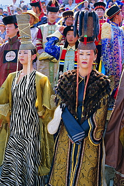 People in traditional costumes at the tournament, Naadam Festival, Ulaan Baatar (Ulan Bator), Mongolia, Asia