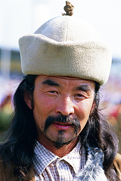 Portrait of a man at the Naadam Festival, Ulaan Baatar (Ulan Bator), Mongolia, Asia