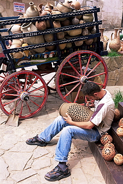 Decorating pottery, Valley of Goreme, central Cappadocia, Anatolia, Turkey, Asia Minor, Asia