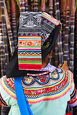 Yi woman at weekly market at Xinjie, Yunnan, China, Asia  