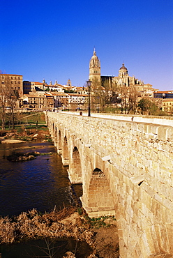 The Roman bridge and city from the Tormes River, Salamanca, Castilla Leon, Spain, Europe