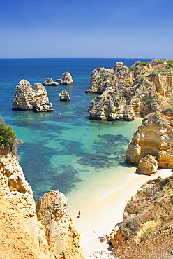 Praia do Camilo (Camilo beach) and coastline, Lagos, western Algarve, Algarve, Portugal, Europe