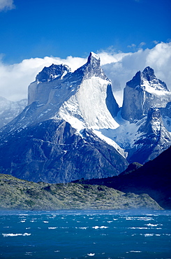 Cuernos del Paine (Horns of Paine) and blue waters of Lake Pehoe, Torres del Paine National Park, Patagonia, Chile, South America