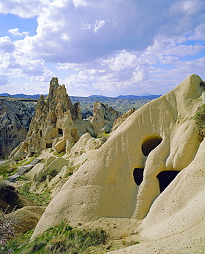 View of monastic dwellings in caves (troglodyte dwelling) at Goreme Open Air Museum, Goreme, Cappadocia, Turkey, Europe