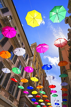 Brightly coloured floating umbrellas, Genoa, Liguria, Italy, Europe