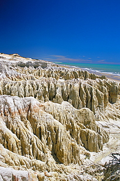 Rock formations and coastline near Canoa Quebrada, Canoa Quedrada, Ceara', Brazil, South America