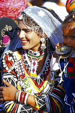 Rajasthani girl adorned with jewellery, Bikaner Desert Festival, Rajasthan state, India, Asia