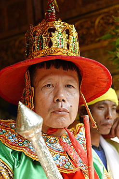 A guard, the queens and the ministers at the biggest Nat ritual (Festival of Spirits) in Taungbyon, Mandalay Division, Burma. Republic of the Union of Myanmar (Burma), Asia 