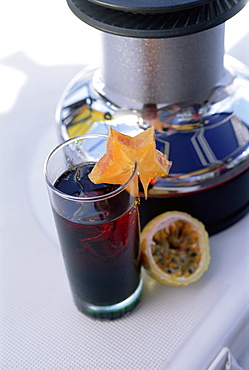 Drink in a glass, on board a catamaran, island of Praslin, Seychelles, Indian Ocean, Africa