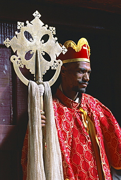 Portrait of a man holding a Christian symbol, Bieta Golgotha, Lalibela, Wollo region, Ethiopia, Africa