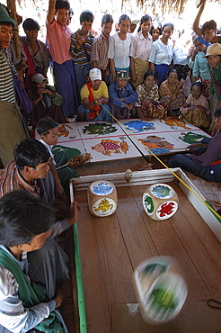 Gambling on market day, Nampan market, Inle Lake, Shan State, Myanmar (Burma), Asia