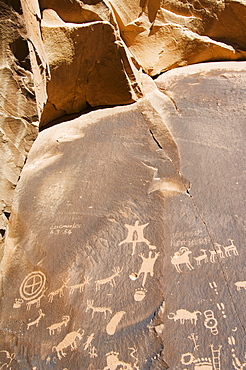 Newspaper Rock, a petroglyph panel etched in sandstone recording perhaps 2000 years of human activity in the area, Newspaper Rock Recreation Site, Utah, United States of America, North America