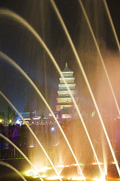 Night time water show at the Big Goose Pagoda Park, Tang Dynasty, built in 652 by Emperor Gaozong, Xian City, Shaanxi Province, China, Asia