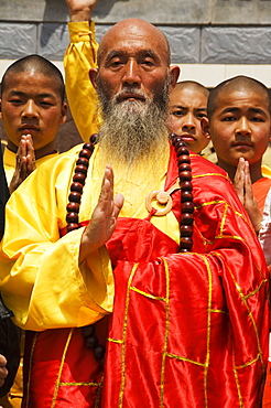 Kung fu students and teacher at a tourist show, Shaolin is the birthplace of kung fu martial art, Shaolin, Henan Province, China, Asia