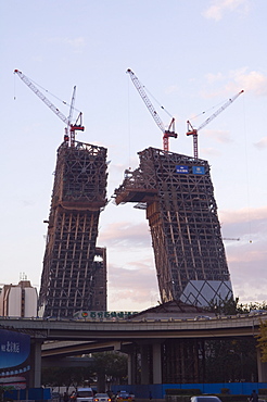 Partly contructed shell of the new CCTV tower building Guomao area, Beijing, China, Asia