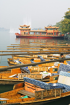 Boats on the waters of West Lake, Hangzhou, Zhejiang Province, China, Asia