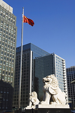 A stone lion statue in the CBD business district, Beijing, China, Asia