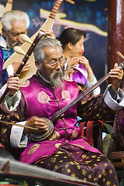 Musicians in a traditional Naxi orchestra, Lijiang Old Town, UNESCO World Heritage Site, Yunnan Province, China, Asia