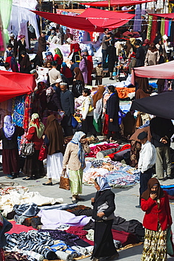 Silk fabrics being sold at the Sunday market, Kashgar (Kashi) city, Xinjiang Provice, China, Asia