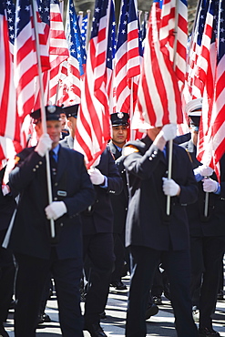 Police carrying American flags, St. Patricks Day celebrations in front of 5th Avenue, Manhattan, New York City, New York, United States of America, North America