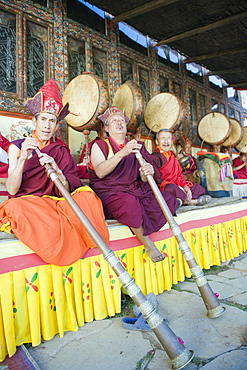 Monks playing horns at a Tsechu (festiva), Gangtey Gompa (Monastery), Phobjikha Valley, Bhutan, Asia