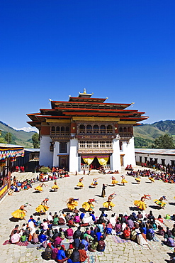 Dancers in costume at Tsechu (festival), Gangtey Gompa (Monastery), Phobjikha Valley, Bhutan, Asia