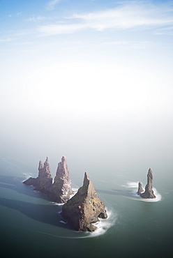 Rock stacks off the coast at Reynisdrangar, Vik, Southern Region, Iceland, Polar Regions