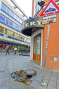 Statue of Cumil, the man at work in a hole, Bratislava, Slovakia, Europe