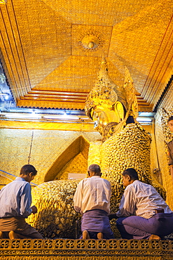 Gold Buddha statue, Mahamuni Paya, Mandalay, Myanmar (Burma), Asia