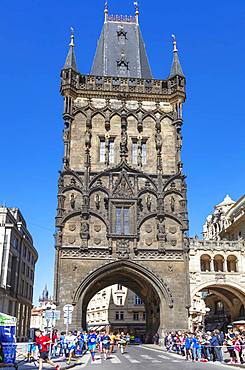 Prague Marathon runners come through the Powder Tower, Prague, UNESCO World Heritage Site, Bohemia, Czech Republic, Europe