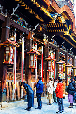 Worshippers at Kitano Tenmangu Shrine, Kyoto, Kansai, Japan, Asia