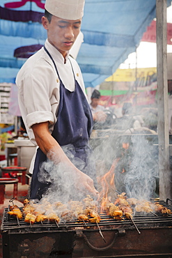 BBQ chicken cook on the street, Pokhara, Nepal, Asia