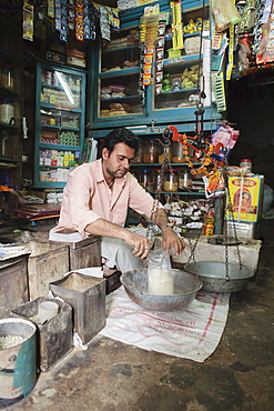 Local rural shopkeeper, Saijpur Ras, Gujarat, India, Asia