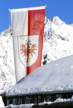 Tirolean flag above village of Solden in Tirol Alps, Solden, Tirol, Austria, Europe