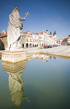 Statue of saint and fountain, Renaissance buildings at Zachariase z Hradce Square, Telc, Jihlava Region, Czech Republic, Europe